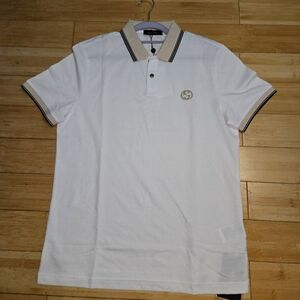 Gucci polo. Tan and White. Double G embroidery.